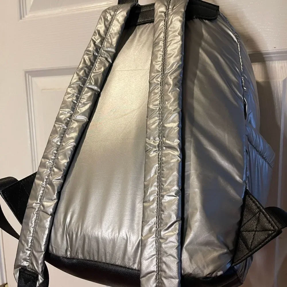 Juicy Couture Metallic quilted silver Backpack with black trim. - Picture 13 of 16